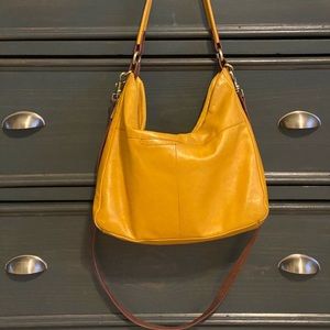“Hobo” Hobo bag. Golden mustard color brown long strap.